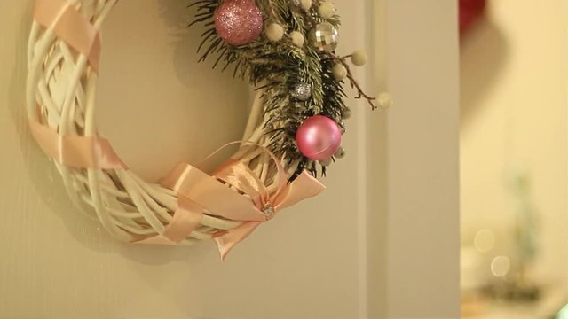 Christmas Wreath On White Door