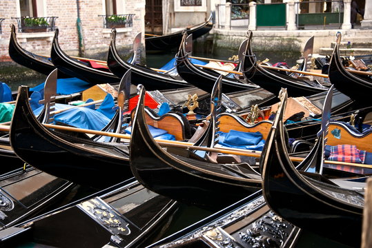 Gondolas parking on a canal, Venice, Italy