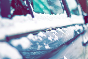 winter newt to a cars window.