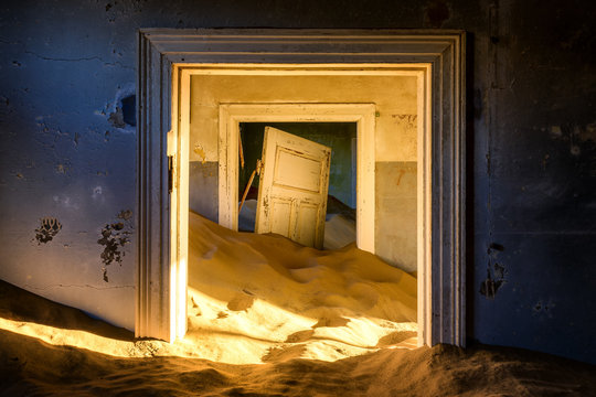 Building taken over by sand, former diamond mining town, now ghost town, Kolmanskop, Luderitz, Karas Region, Namibia