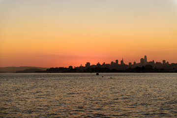 Fototapeta premium Sun rising over downtown San Francisco, California, USA