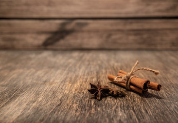 cinnamon stick on old wooden background