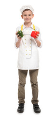 Cute little chef with peppers on white background