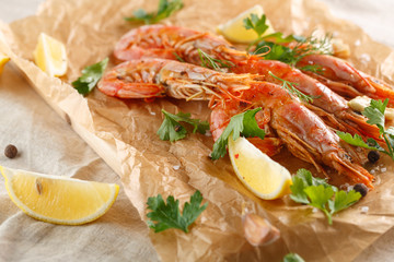 Grilled shrimps with spice, garlic and lemon. Grilled seafood. closeup