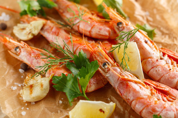 Grilled shrimps with spice, garlic and lemon. Grilled seafood. closeup