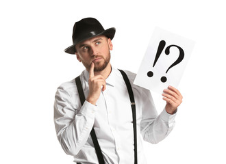 Thoughtful detective holding sheet of paper with exclamation and interrogation marks on white background