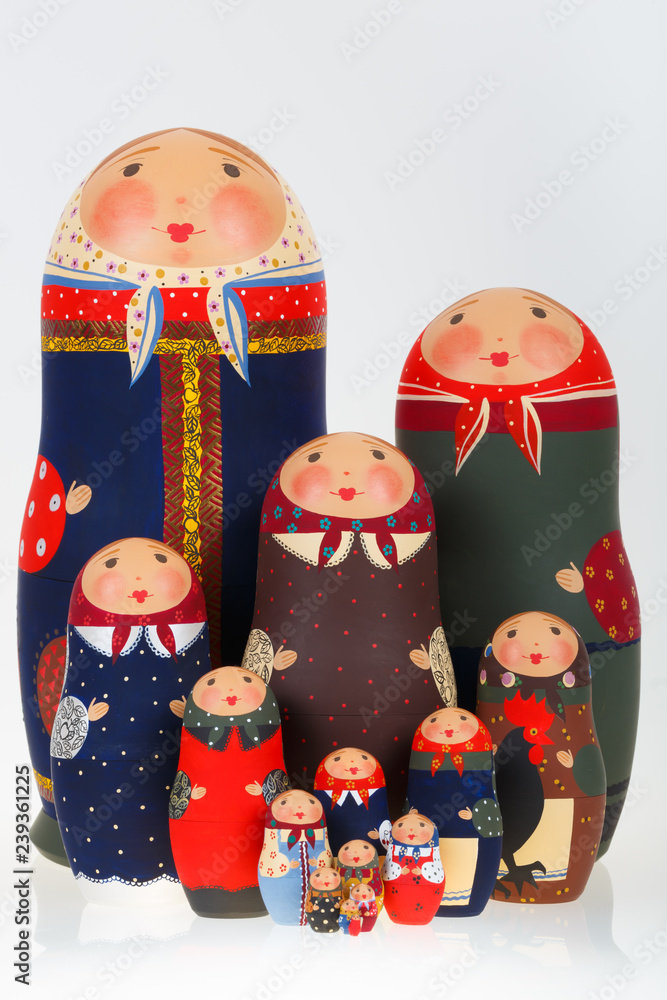 Wall mural Set of Russian dolls babushka matryoshka isolated on white