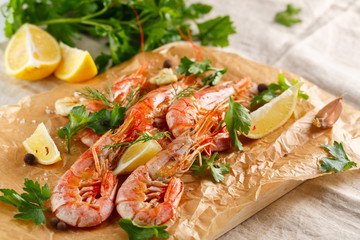 Grilled shrimps with spice, garlic and lemon. Grilled seafood.