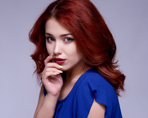 Beauty Model Woman with Long Brown Hair. Healthy Hair and Beautiful Professional Makeup.