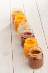 Line of assorted baby food