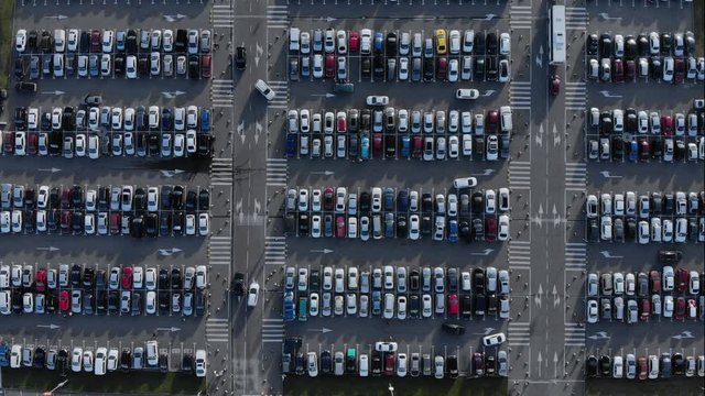 Aerial timelapse of busy parking at shopping mall in Sochi