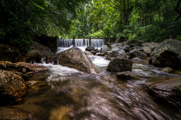 Waterfalls in the rainforest photographed in Khao Yai National Park, Thailand.