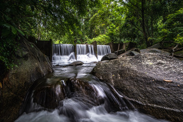 Waterfalls in the rainforest photographed in Khao Yai National Park, Thailand.