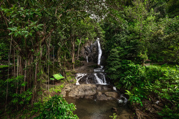 Waterfalls in the rainforest photographed in Khao Yai National Park, Thailand.
