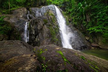 Obraz na płótnie Canvas Waterfalls in the rainforest photographed in Khao Yai National Park, Thailand.