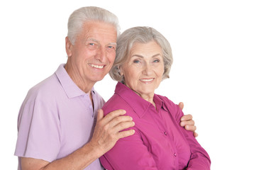 Happy senior couple isolated on white background