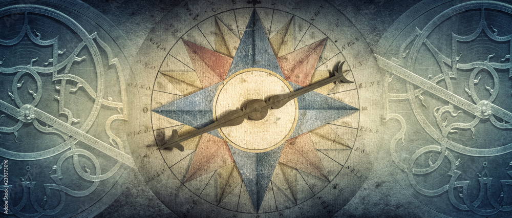 Wall mural old compass and astrolabe - ancient astronomical device on vintage background. abstract old conceptu