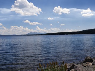Scenic wide shot of Lake Yellowstone with gorgeous clouds at Yellowstone National Park, Wyoming, USA.