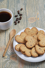 Cookies in the shape of a heart and coffee