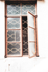 old vintage window of house old fashion design classic on rustic painted concrete wall background