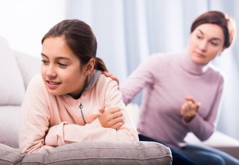 Mother reprimands her daughter