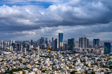 Aerial  view of old Tel Aviv buildings  over new Sarona skyscrapers..