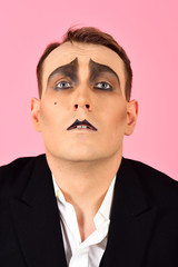 Skill at improvisation. Mime artist. Mime with face paint. Man with mime makeup. Theatre actor...