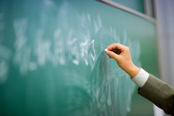Writing on a chalk board.