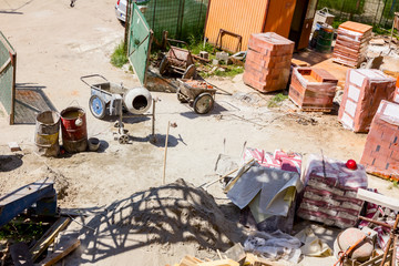 Above view on building site, scaffold, packed, piled resources