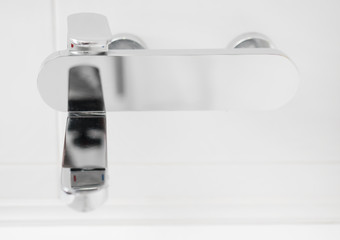 Close-up view of modern water tap.