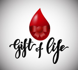 Lettering Gift of life typographic composition with realistic heart.