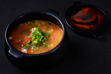 Hungarian goulash soup bograch, meat stew in a cast iron pot. meat restaurant, ethnic cuisine. 