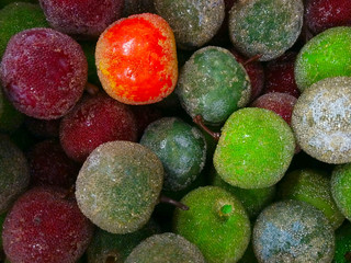 Plastic Apples In The Box. Abstract Colorful Background.
