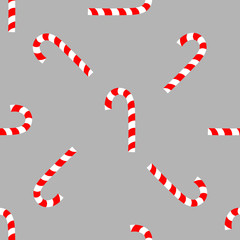 Christmas seamless pattern with candy on gray background.