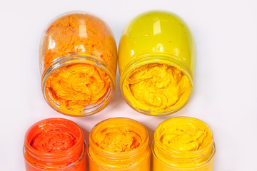 light yellow orange and yellow are warm tone color of printing screen ink in white background ..