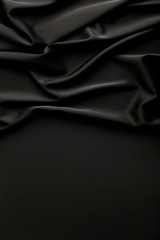Fototapeta premium Background of black satin fabric