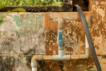 Blue PVC Valve/ Plastic Water Pipeline - Vintage Moldy Wall Texture