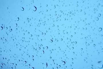 drops of water on a blue background