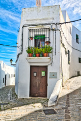 Fototapeta premium Beautiful street of Vejer de la Frontera, a beautiful town in the south of Spain