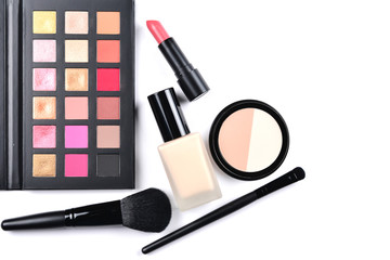 Professional makeup products with cosmetic beauty products, foundation, lipstick,  eye shadows, eye lashes, brushes and tools.