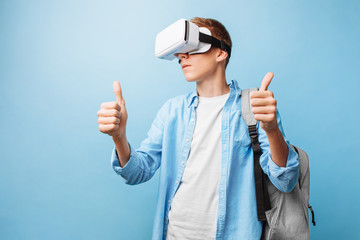 student wearing virtual reality glasses, on a blue background