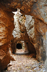 A mining tunnel in Cerro del Hierro (The Iron Hill) , eroded landscape of old abandoned mines in the Natural Park Sierra Norte of Seville, Andalusia, Spain