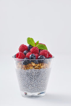 Chia pudding with granola and berries