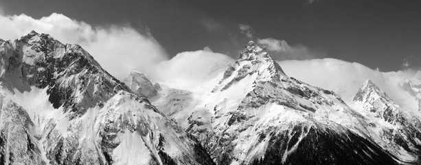 Black and white panorama of snowy mountains