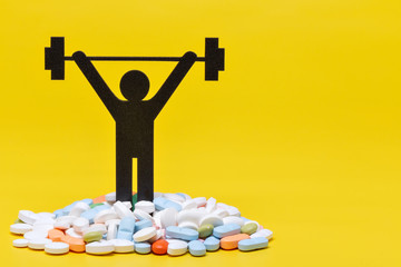 weightlifting pictogram wiht pills