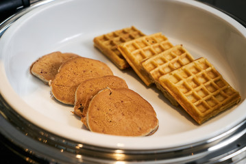 Assorted pancake, waffle crepe, close-up. Pastry buffet catering