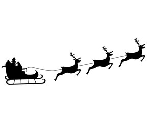 Santa Claus rides in harness on the reindeer