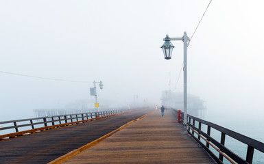 View of the wooden bridge in foggy weather, Santa Barbara, California, USA. Copy space for text.