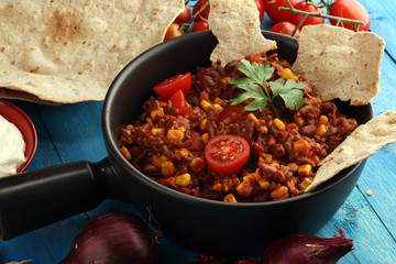 Hot chili con carne. mexican food tasty and spicy.