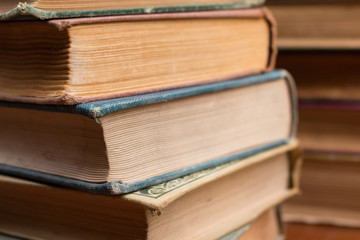 Stack of Books on Wooden Table